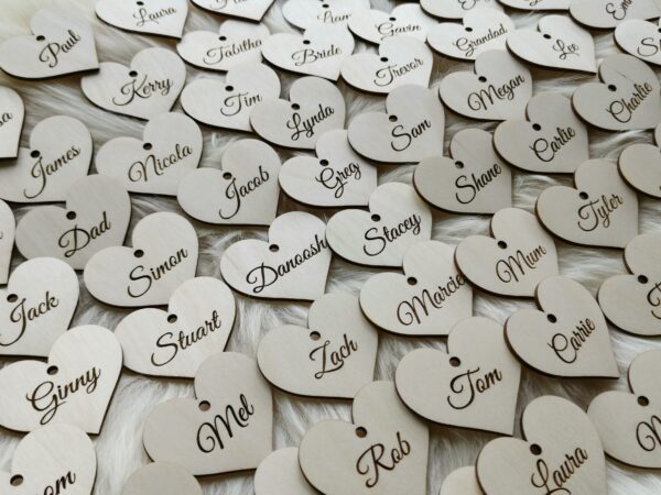 Personalized wooden heart place cards